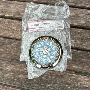 Thirty-one compact mirror garden bloom